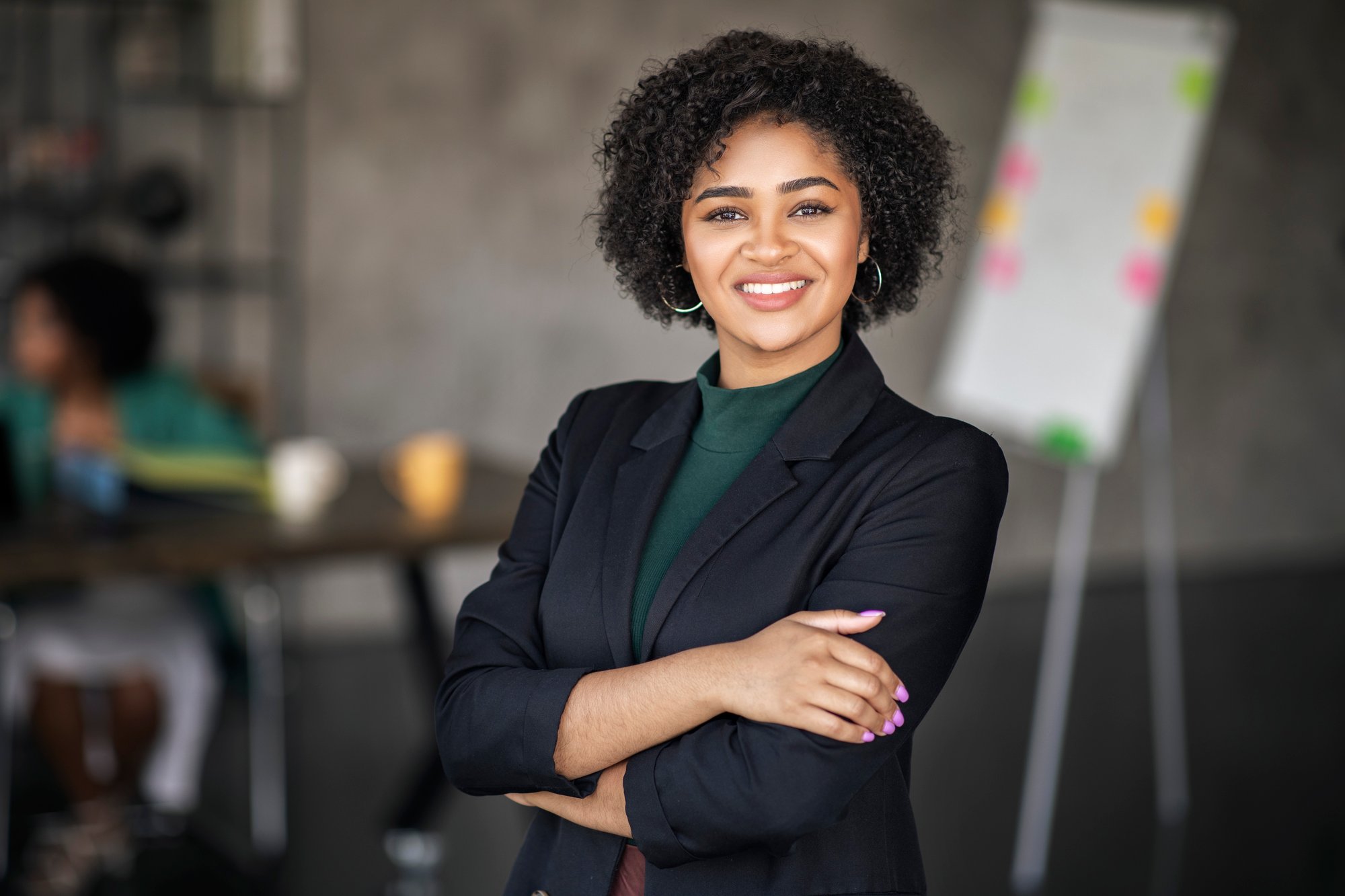 portrait-happy-black-businesswoman-smiling-standing-modern-office portrait-happy-black-businesswoman-smiling-standing-modern-office